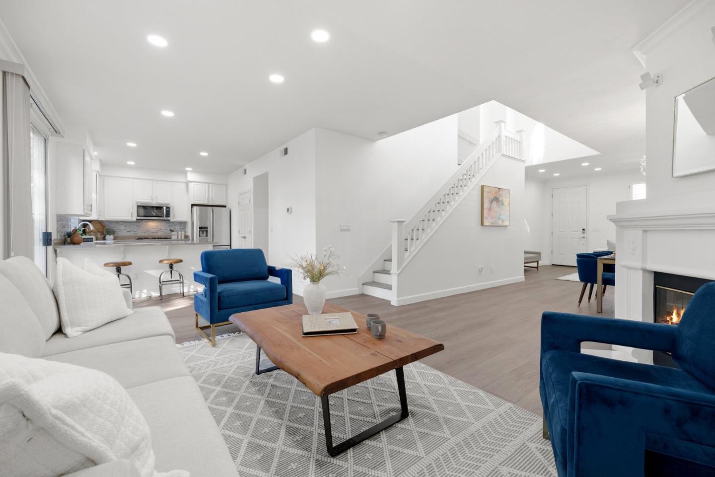 4675 La Crescent Loop San Jose, CA 95136 - Photo 6 of 22 a living room with furniture kitchen view and a table