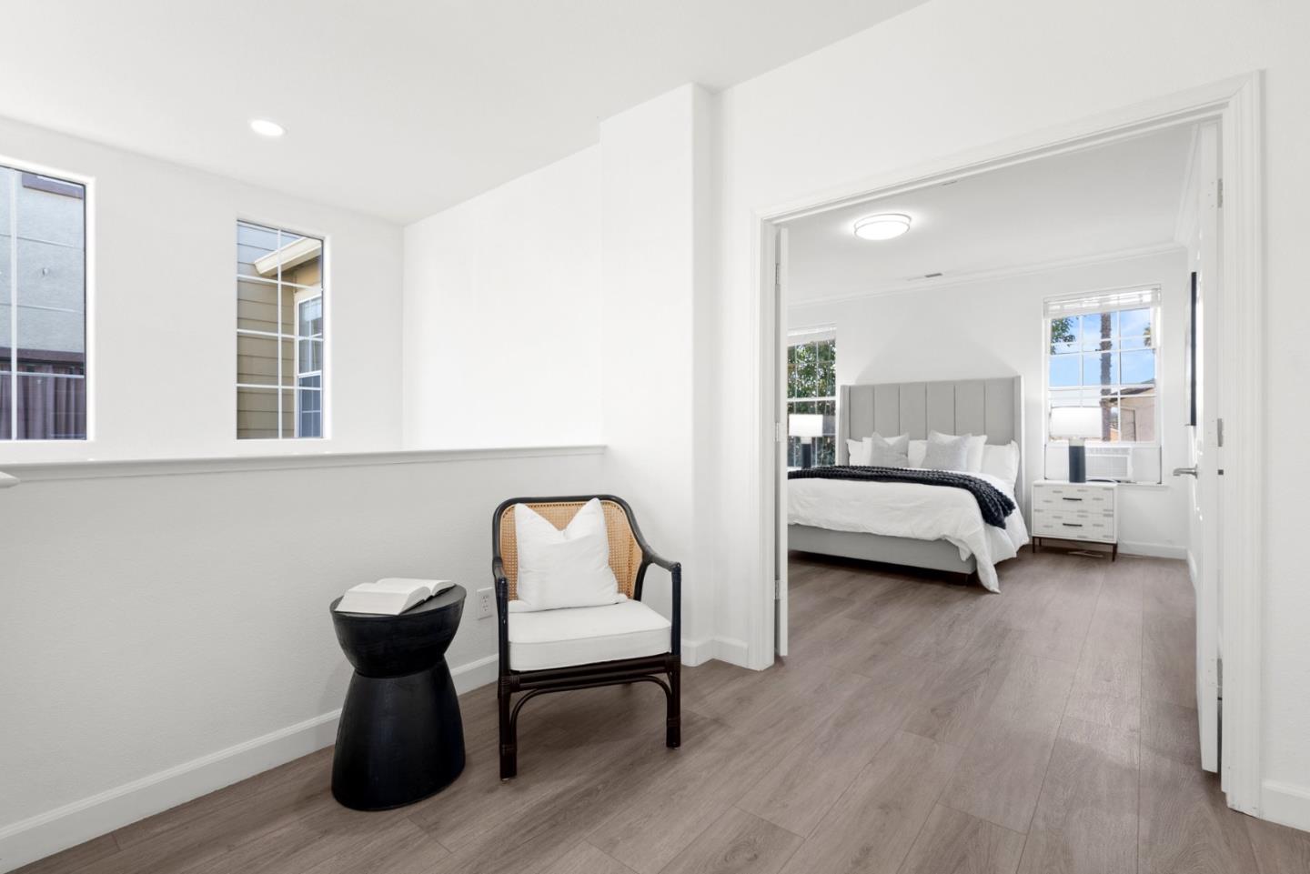 4675 La Crescent Loop San Jose, CA 95136 - Photo 10 of 22 a bedroom with furniture and a chair