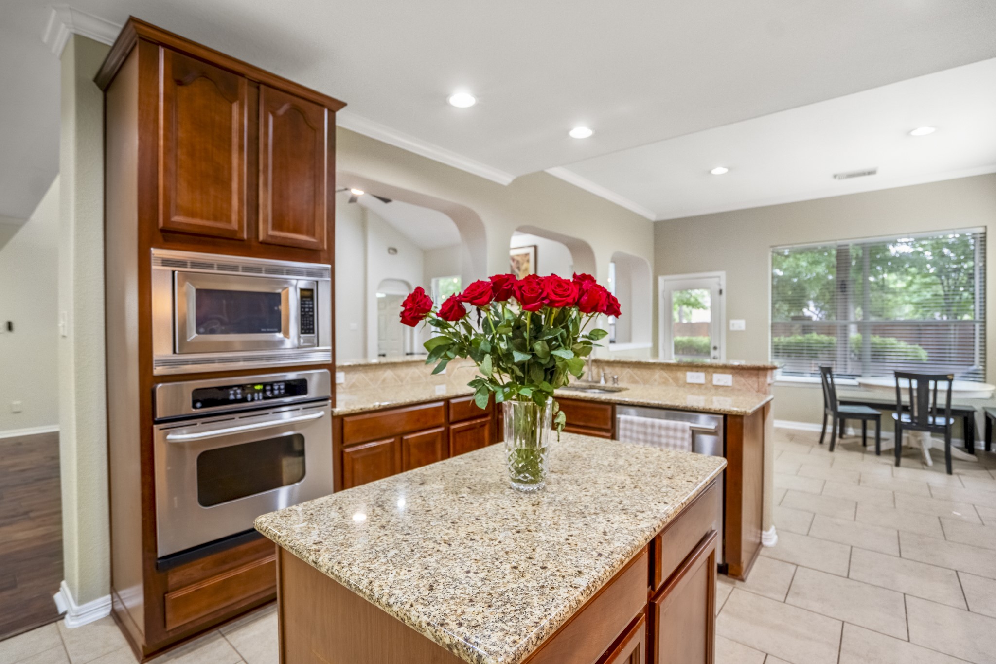 10410 Pitcataway Drive Spring, TX 77379 - Photo 47 of 48 Enjoy the open floorplan that offers your family many options with a breakfast room that has easy access to the backyard with fabulous views of the tranquility of the landscaped yard through the large windows.