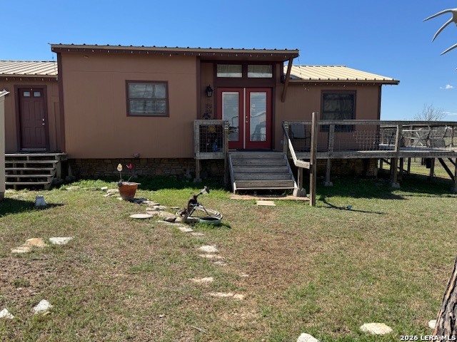 140 Bryce Lane Comfort, TX 78013 - Photo 2 of 9 a backyard of a house with barbeque oven table and chairs