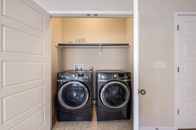 a view of washer and dryer in a utility room