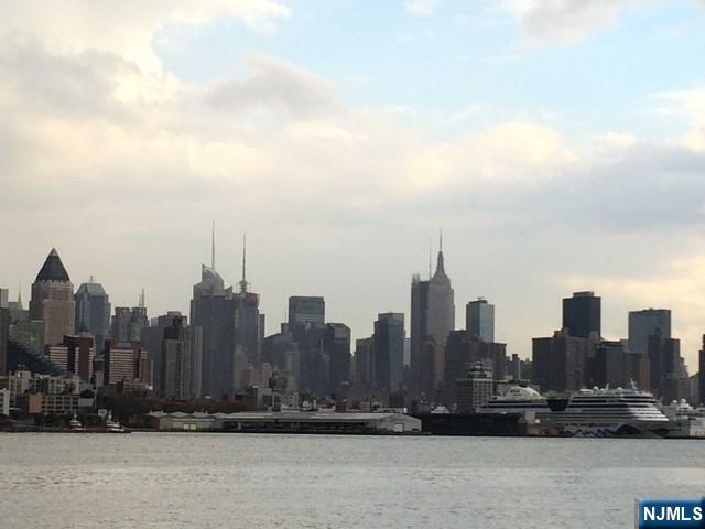 305 Palisade Avenue, Unit 208 Cliffside Park, NJ 07010 - Photo 12 of 16 a view of a city with tall buildings