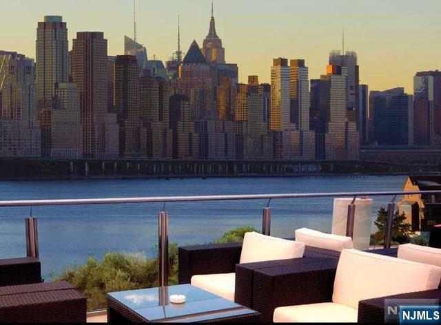 305 Palisade Avenue, Unit 208 Cliffside Park, NJ 07010 - Photo 2 of 16 a view of roof with furniture