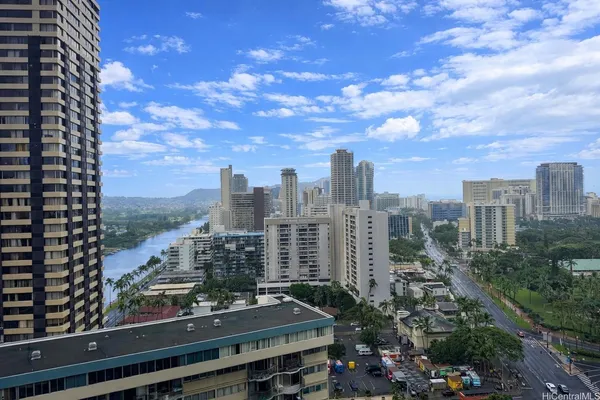 a view of a city with tall buildings