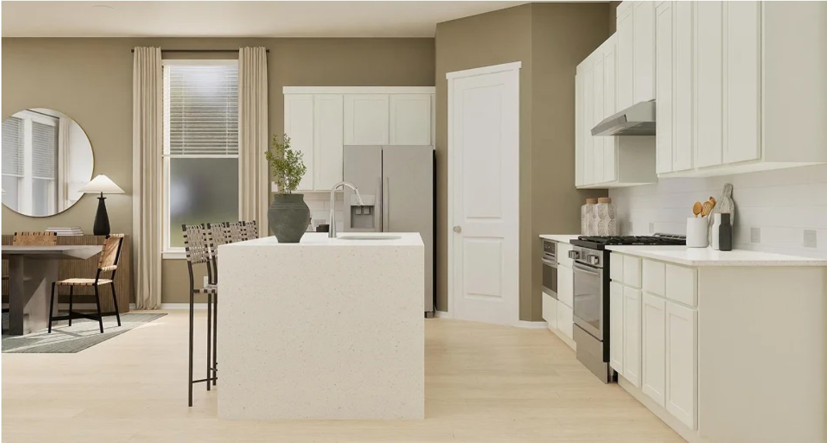 2708 Grove Crest Drive Rosenberg, TX 77469 - Photo 3 of 11 a kitchen with a refrigerator and a sink