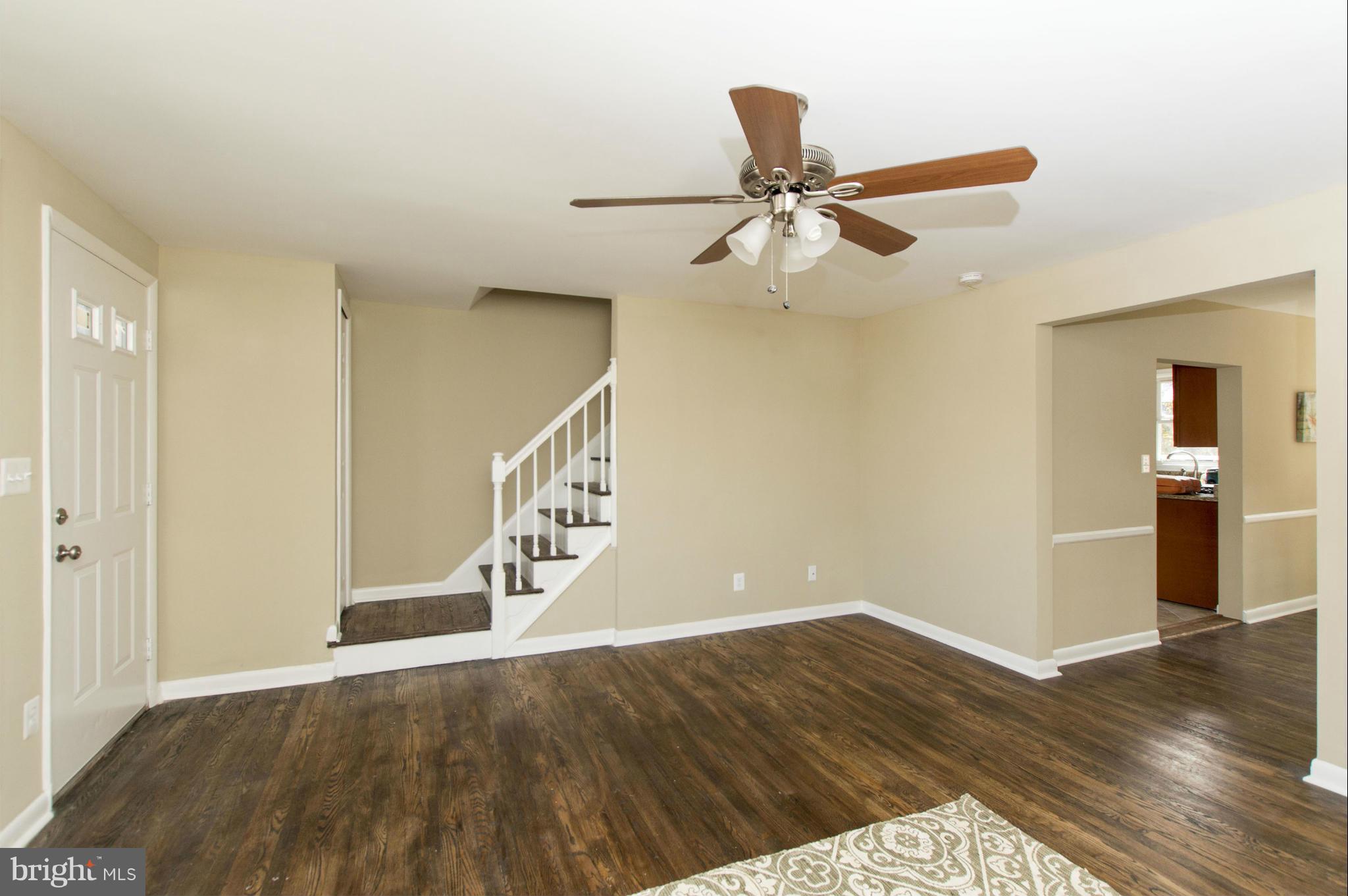 1111 Hollen Road Baltimore, MD 21239 - Photo 12 of 30 a view of empty room with wooden floor