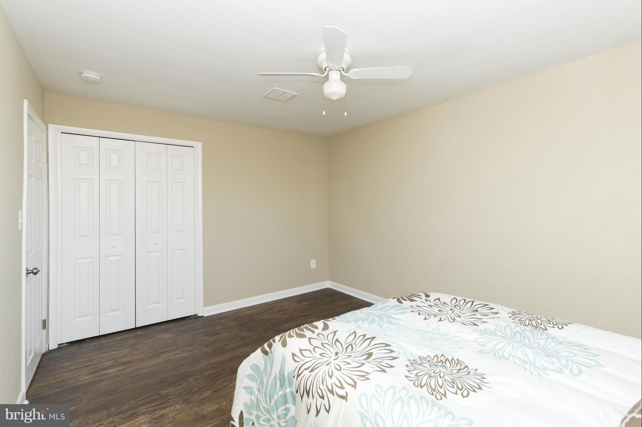 1111 Hollen Road Baltimore, MD 21239 - Photo 15 of 30 a view of a big room with wooden floor
