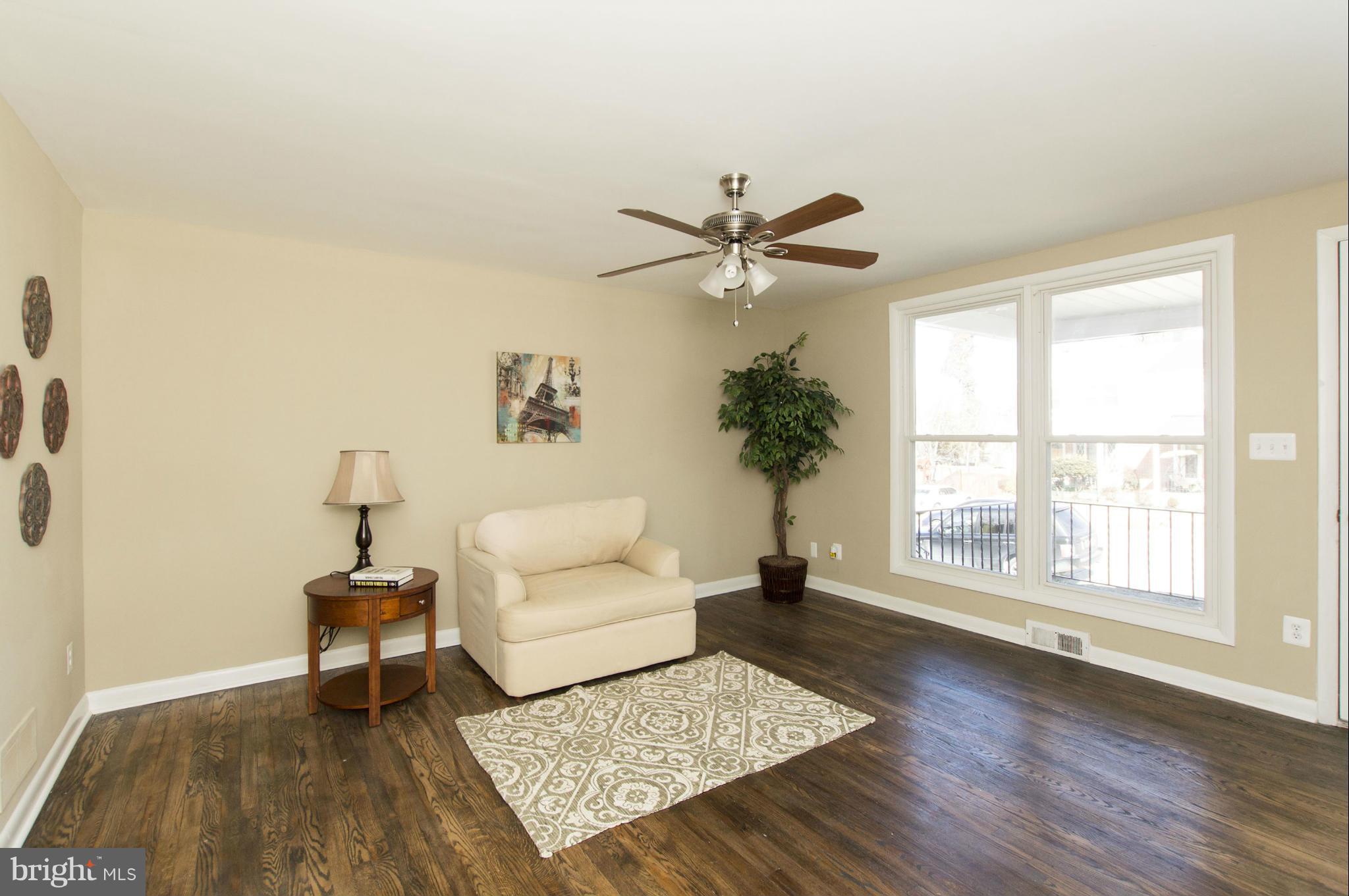 1111 Hollen Road Baltimore, MD 21239 - Photo 10 of 30 a living room with furniture and a window