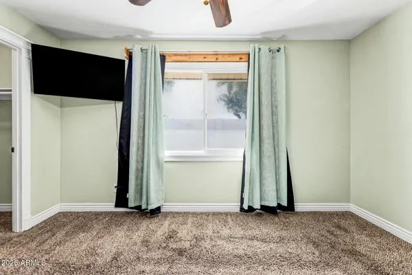 an empty room with window