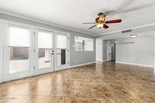 a view of a kitchen with a sink and cabinet area