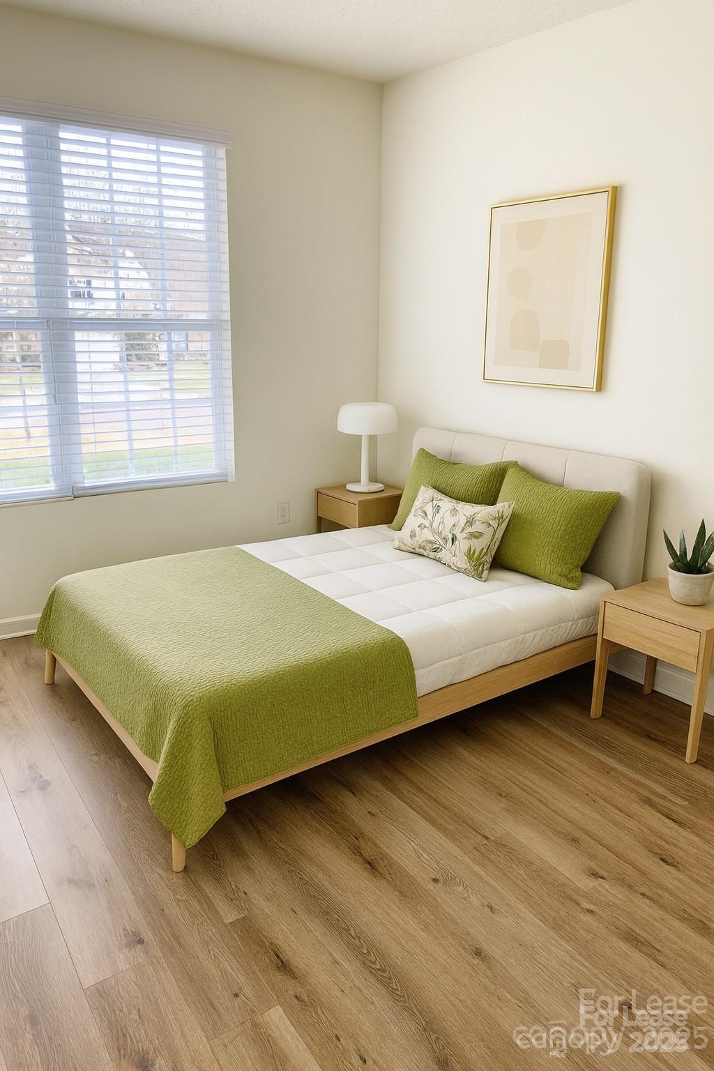 3232 Barons Court Road Charlotte, NC 28213 - Photo 11 of 11 a bedroom with a bed and a couch