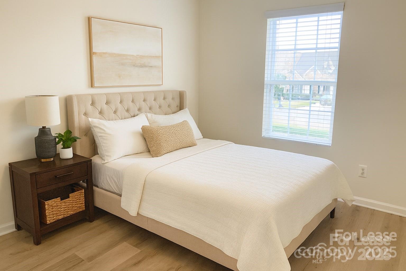 3232 Barons Court Road Charlotte, NC 28213 - Photo 9 of 11 a bedroom with a bed and window