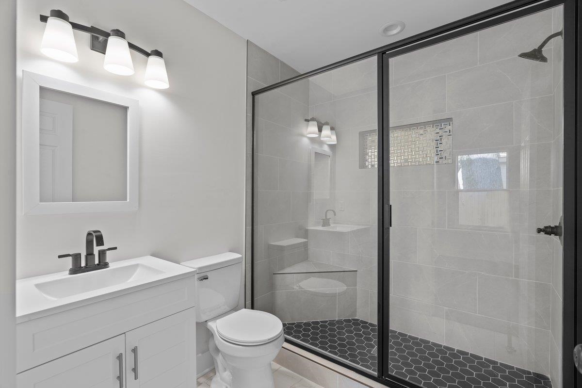 3220 Seminole Road Memphis, TN 38111 - Photo 14 of 23 Bathroom featuring vanity and a shower stall