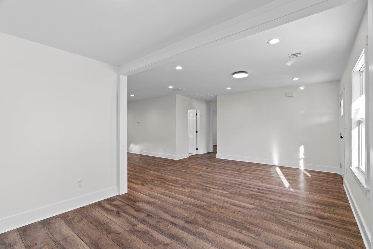 3220 Seminole Road Memphis, TN 38111 - Photo 19 of 23 Unfurnished room with dark wood-type flooring and recessed lighting