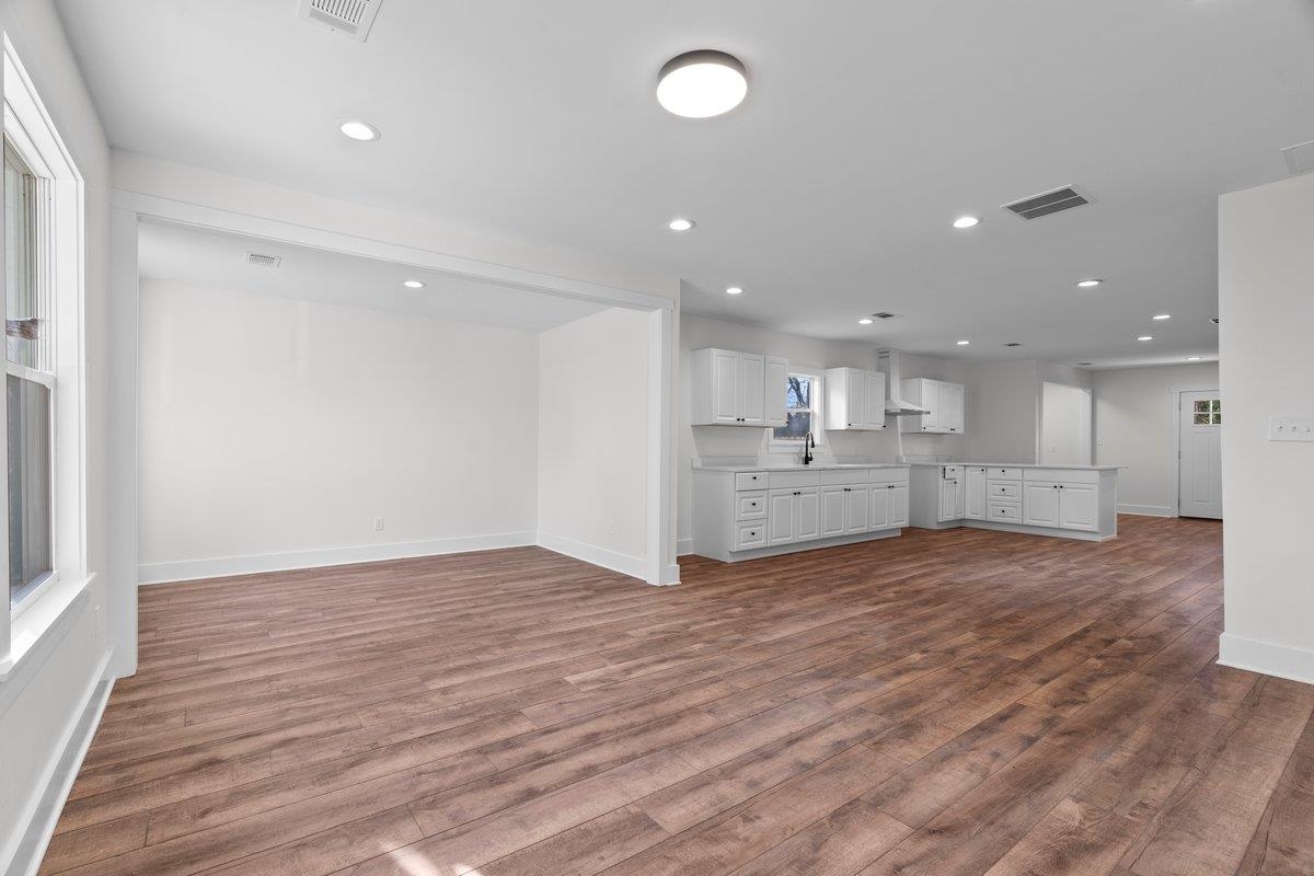 3220 Seminole Road Memphis, TN 38111 - Photo 20 of 23 Unfurnished living room with recessed lighting and dark wood-style flooring