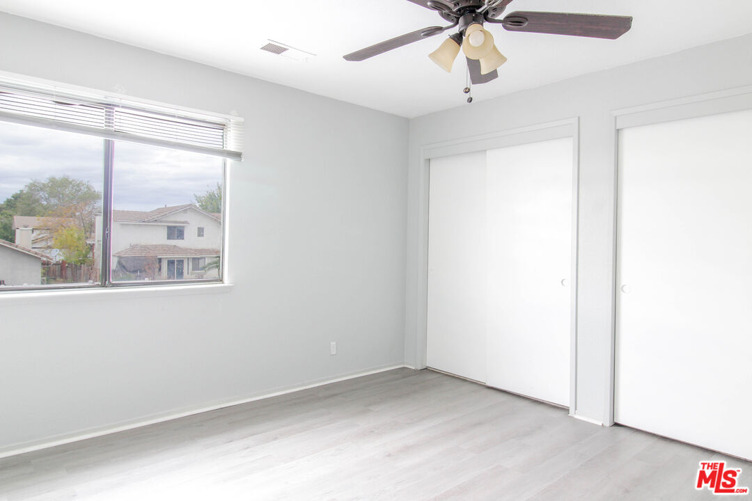 45809 Evelyn Court Lancaster, CA 93534 - Photo 15 of 24 a view of an empty room with a window