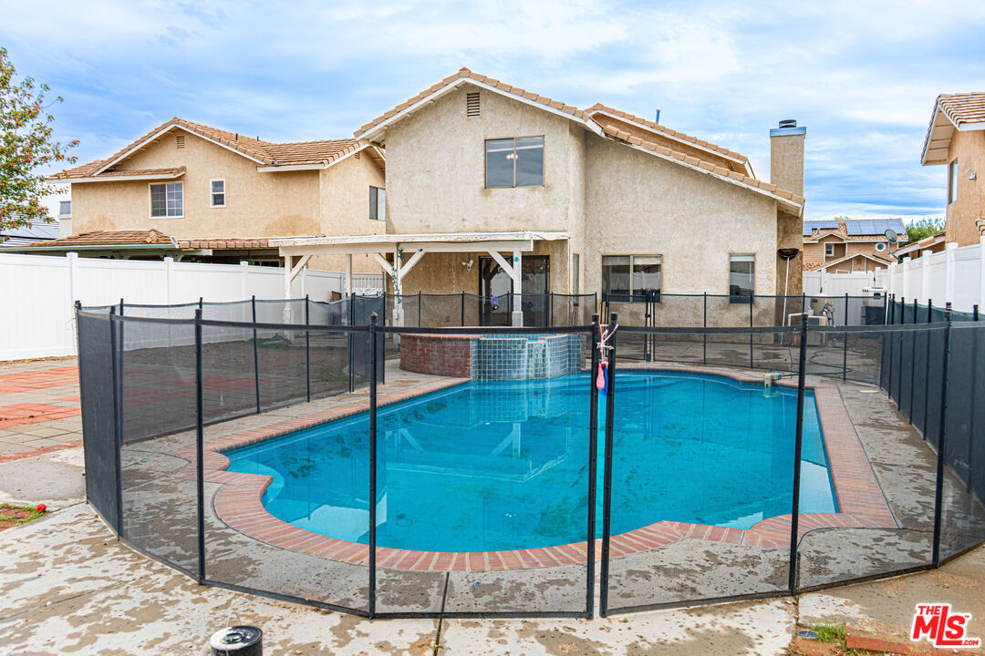 45809 Evelyn Court Lancaster, CA 93534 - Photo 21 of 24 a view of a house with a backyard