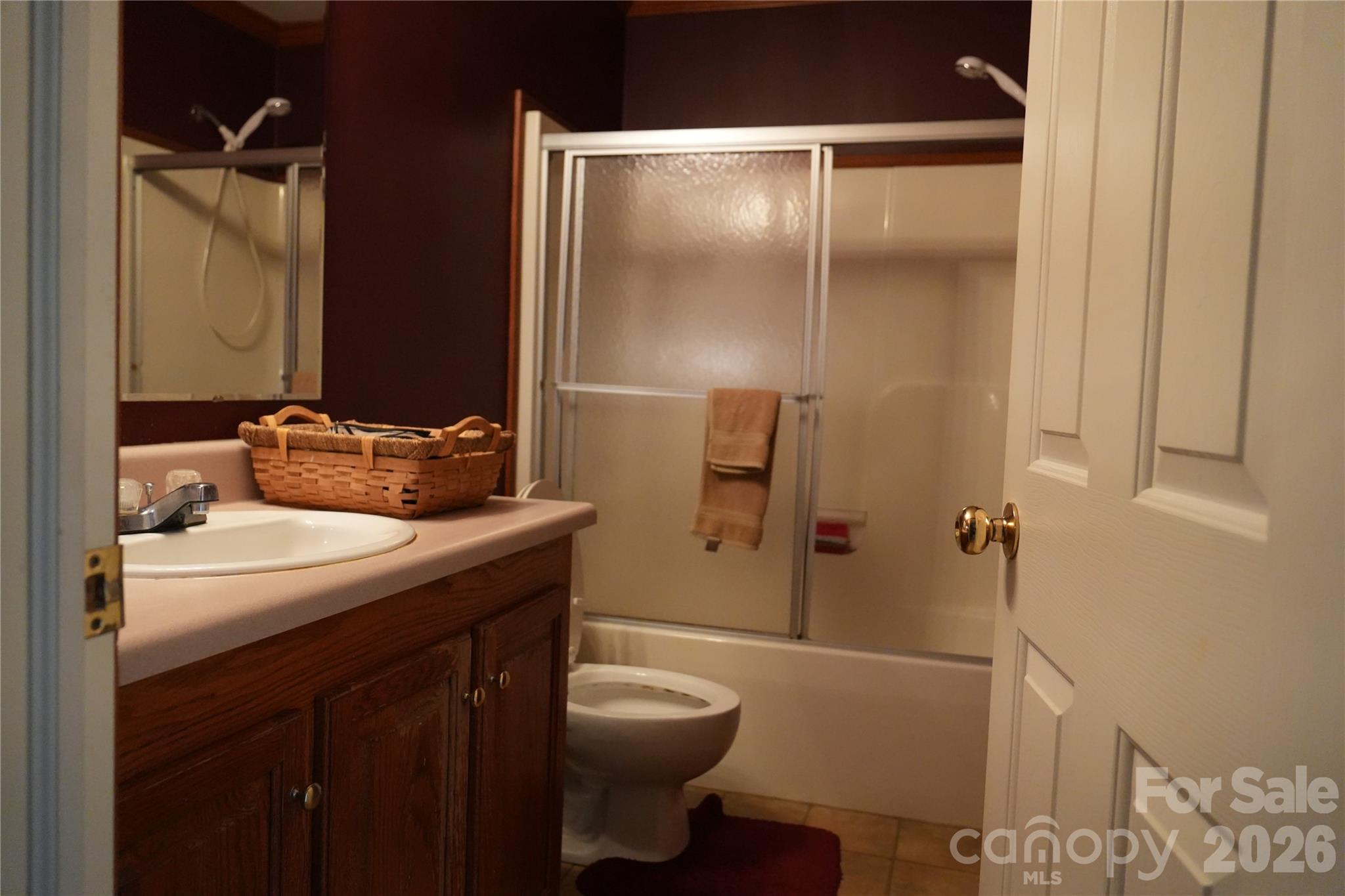 424 Press Walters Road Hartsville, SC 29550 - Photo 8 of 10 a bathroom with a granite countertop sink toilet and shower