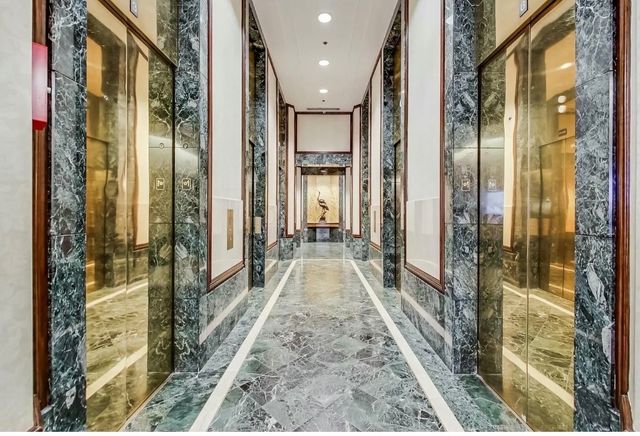 a view of a bathroom with shower