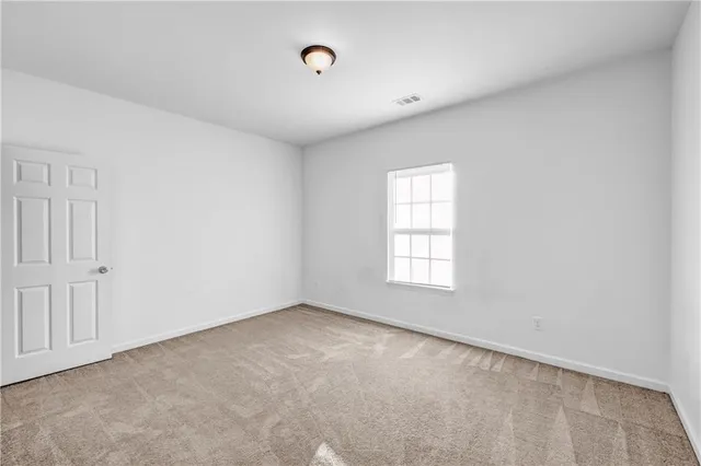 an empty room with a window