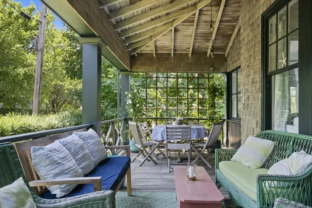 a outdoor living space with furniture and a potted plant