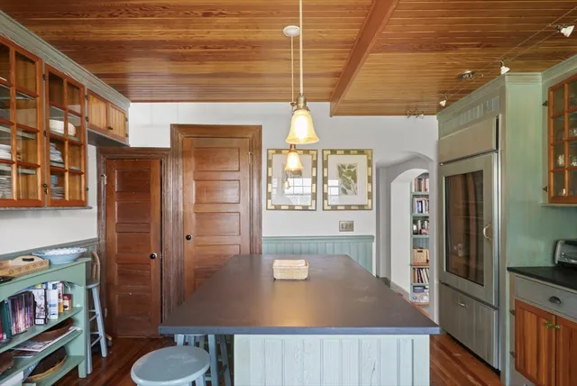 a view of a living room and bathroom