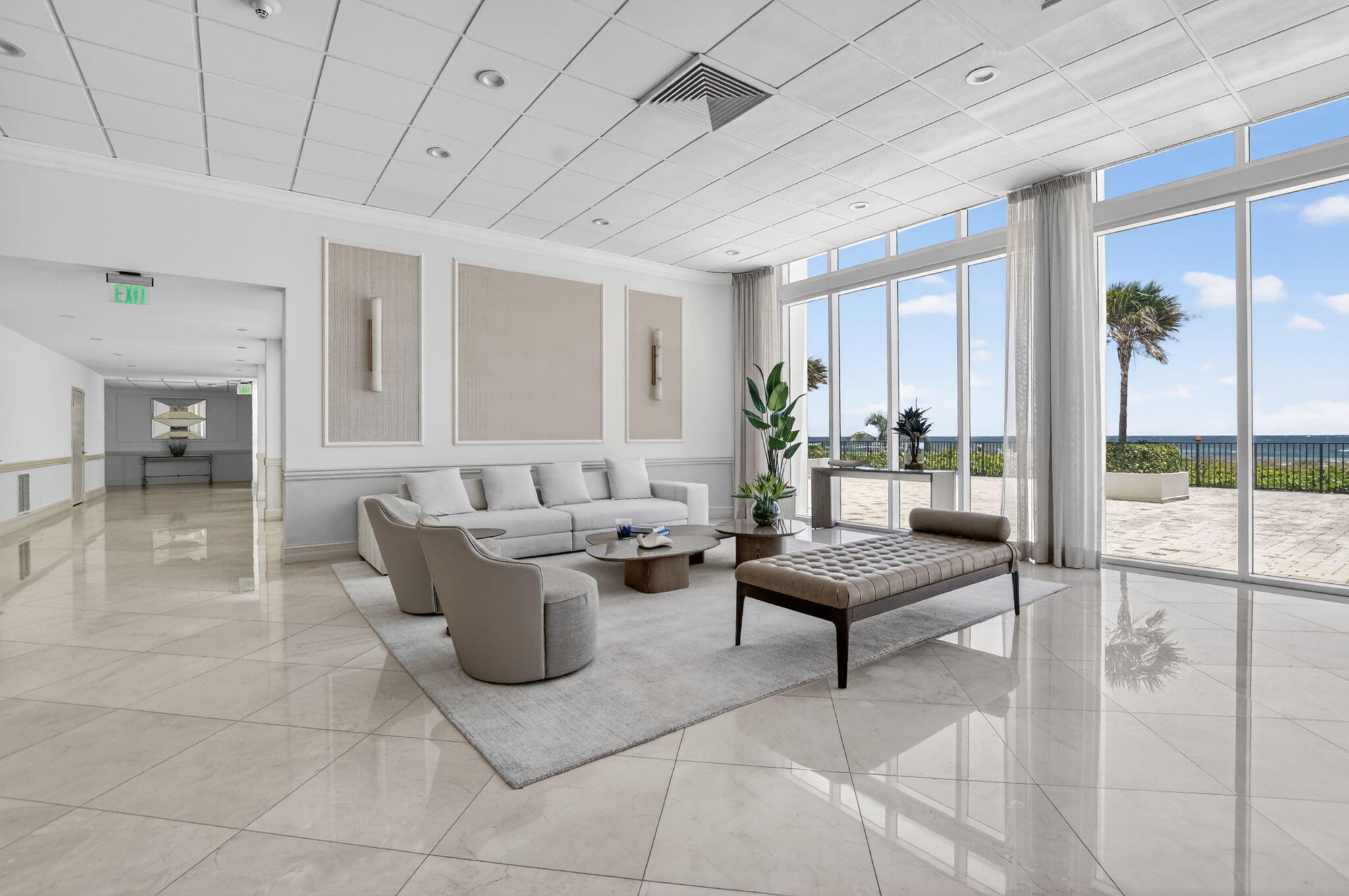 2800 South Ocean Boulevard, Unit 23C Boca Raton, FL 33432 - Photo 49 of 50 a living room with furniture and a potted plant