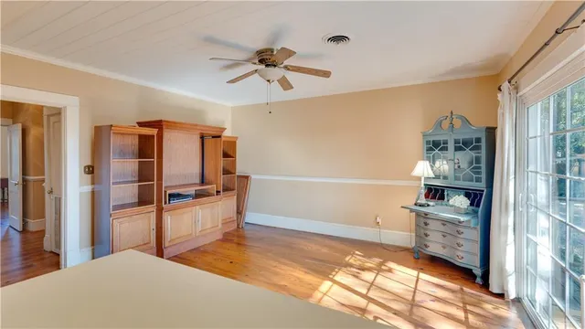 a kitchen with stainless steel appliances a refrigerator and a stove top oven