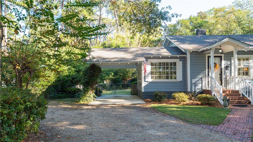 803 Forrest Avenue Tifton, GA 31794 - Photo 2 of 52 a front view of a house with a yard and porch
