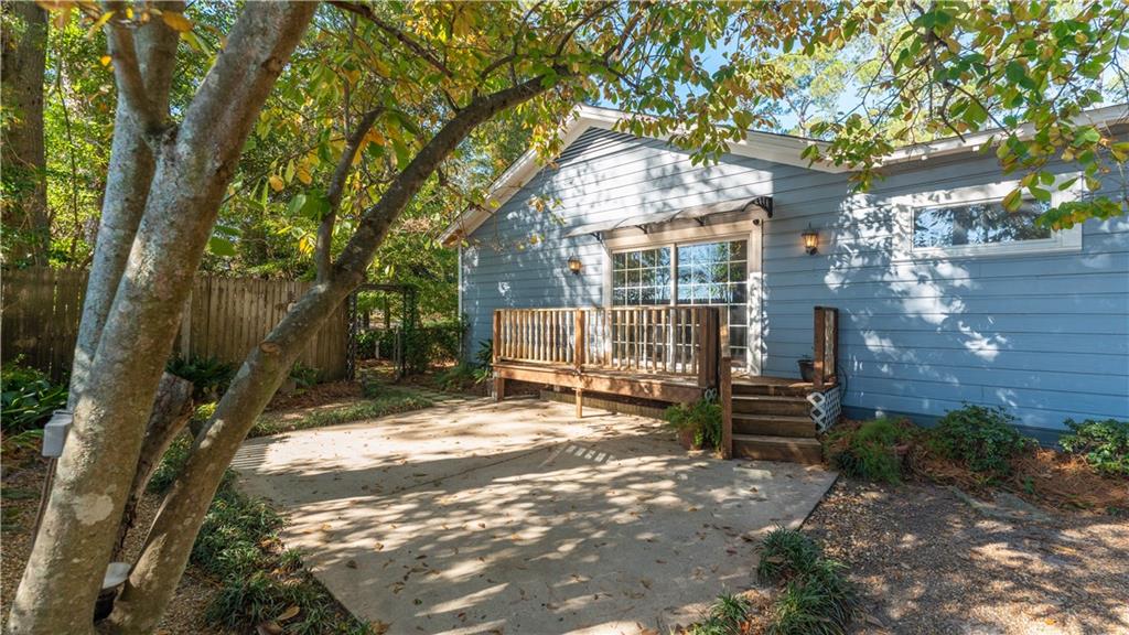 803 Forrest Avenue Tifton, GA 31794 - Photo 28 of 52 a view of a yard with plants and large trees