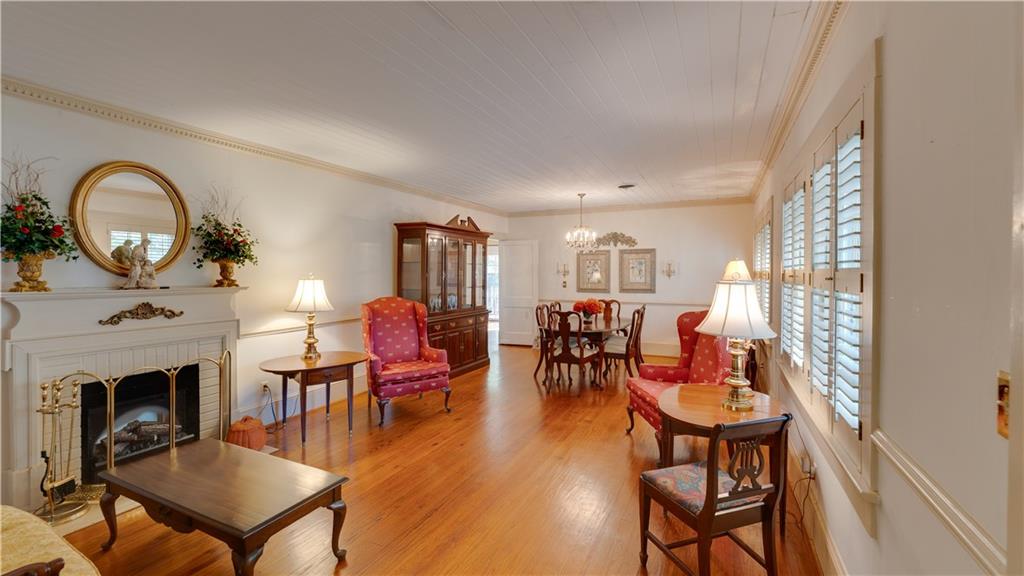 803 Forrest Avenue Tifton, GA 31794 - Photo 3 of 52 a living room with furniture a fireplace and a window