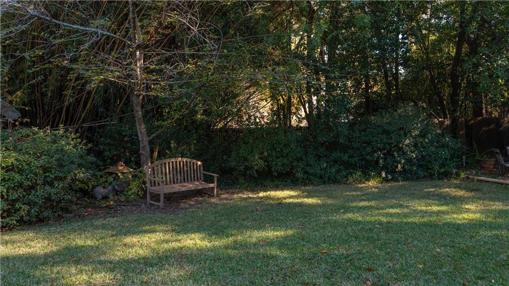 803 Forrest Avenue Tifton, GA 31794 - Photo 33 of 52 a view of a bench in a garden