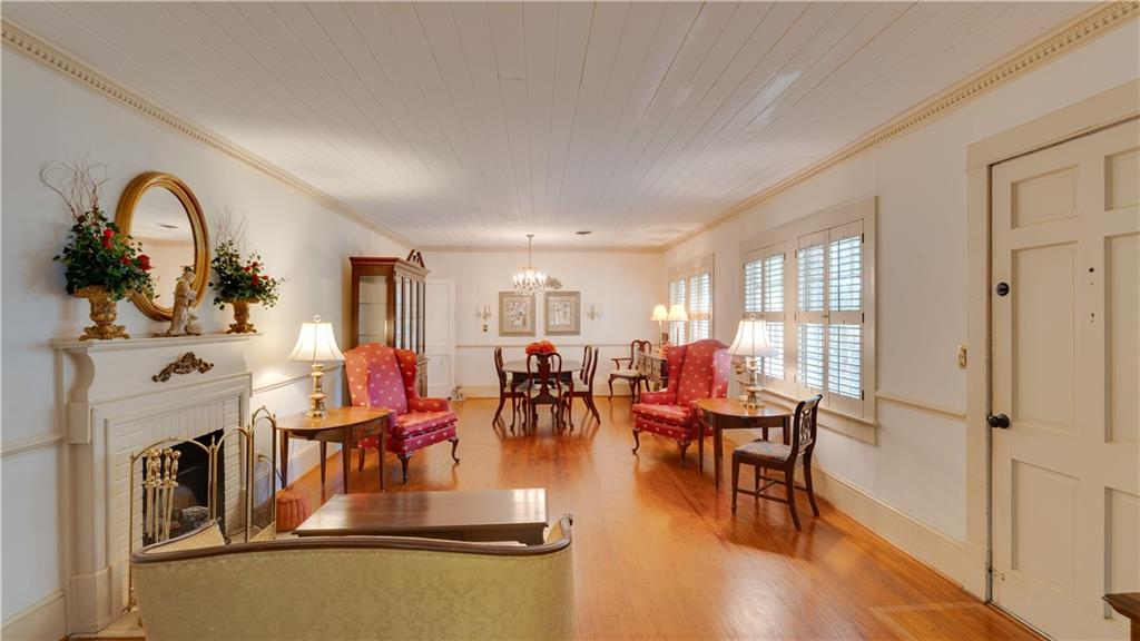 803 Forrest Avenue Tifton, GA 31794 - Photo 4 of 52 a living room with fireplace furniture and a large window