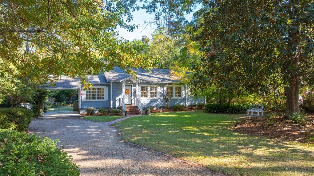 803 Forrest Avenue Tifton, GA 31794 - Photo 42 of 52 a view of a house with a yard porch and sitting area