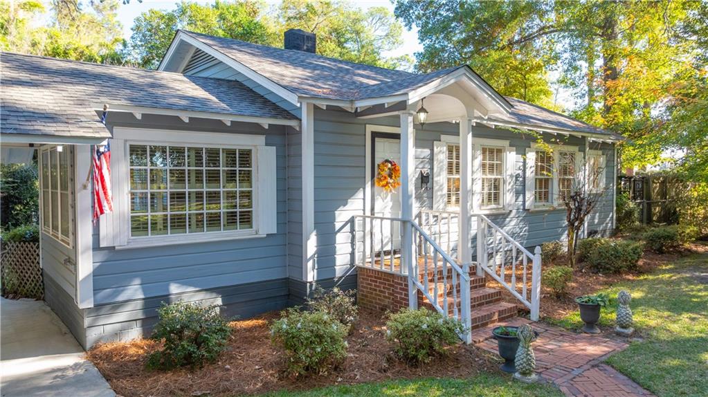 803 Forrest Avenue Tifton, GA 31794 - Photo 46 of 52 a front view of a house with garden