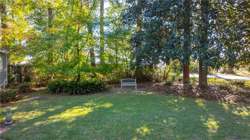 803 Forrest Avenue Tifton, GA 31794 - Photo 47 of 52 a view of a backyard with large trees