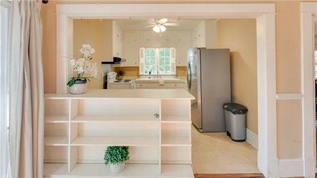 a bathroom with a shower and a mirror