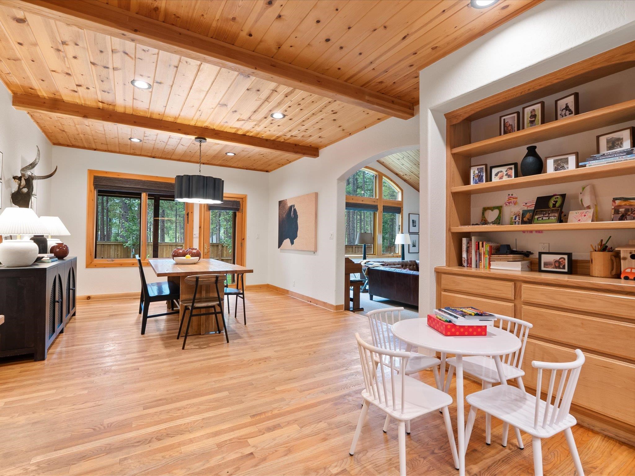 355 Quail View Circle Clio, CA 96106 - Photo 22 of 48 a dining room with furniture and wooden floor