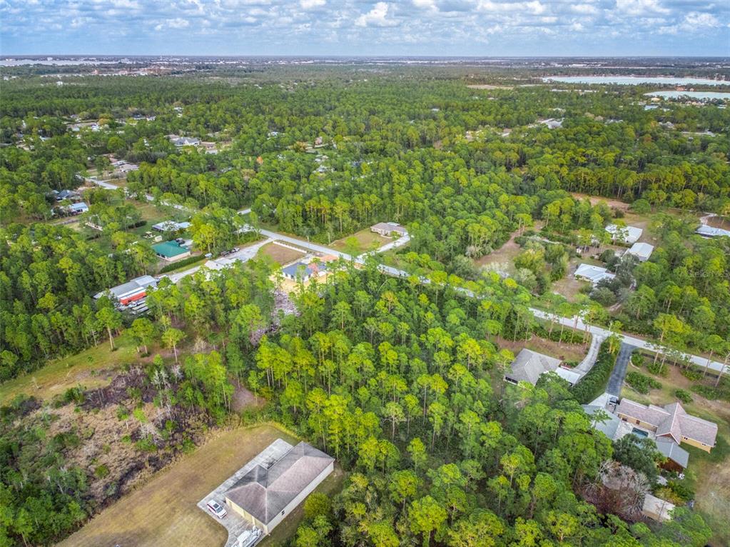 5817 Wolf Lake Road Sebring, FL 33875 - Photo 13 of 20 a view of an outdoor space and a yard