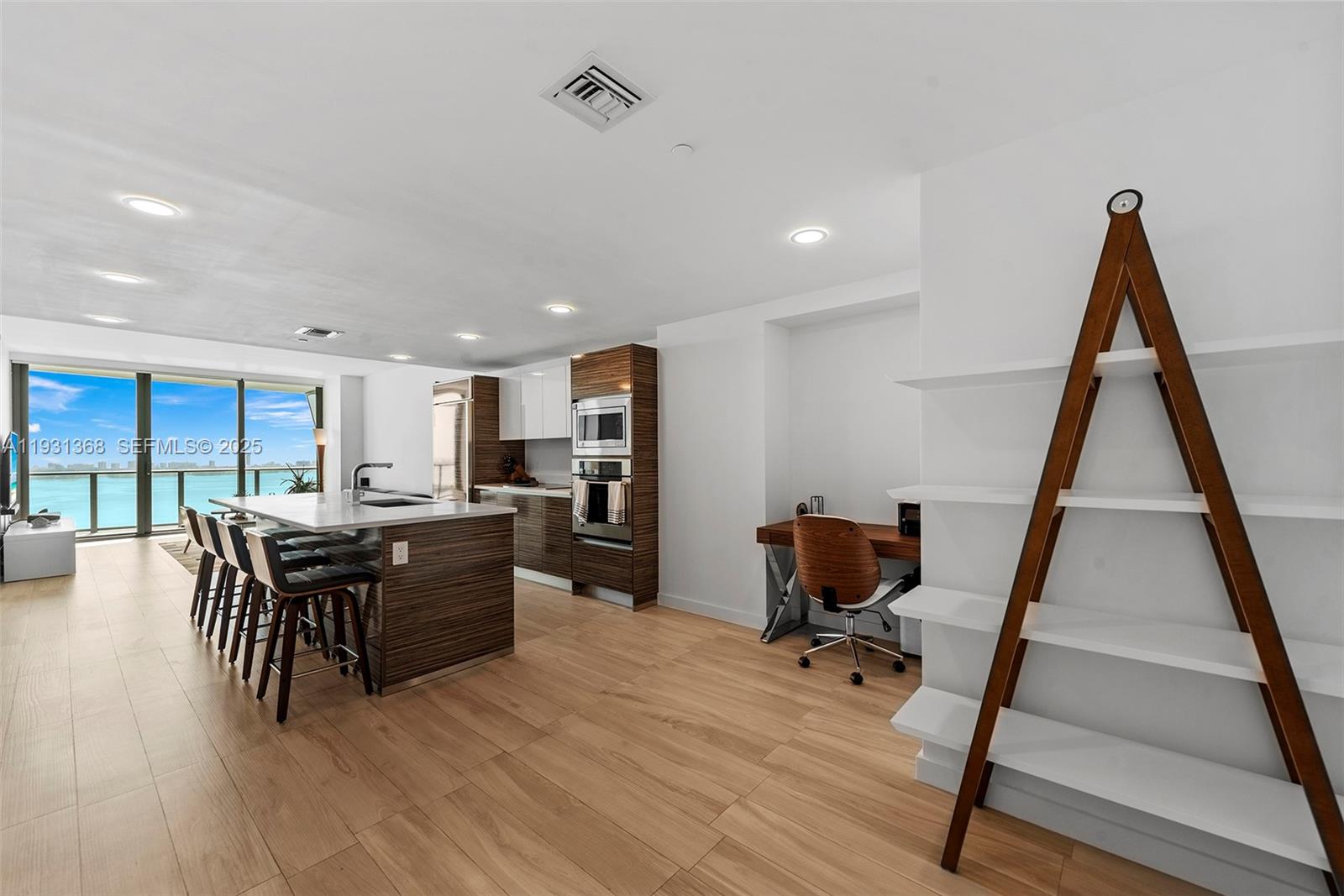 460 Northeast 28th Street, Unit 3903 Miami, FL 33137 - Photo 21 of 44 a view of a dining room with furniture window and wooden floor