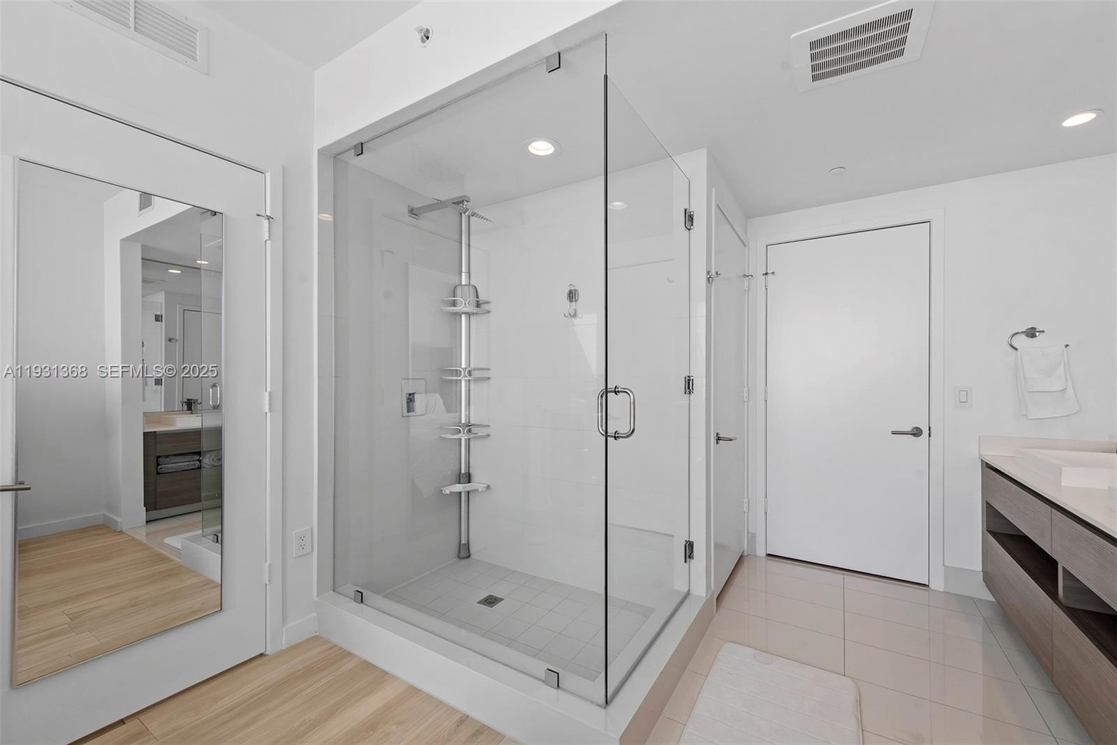 460 Northeast 28th Street, Unit 3903 Miami, FL 33137 - Photo 33 of 44 a bathroom with a shower and a sink