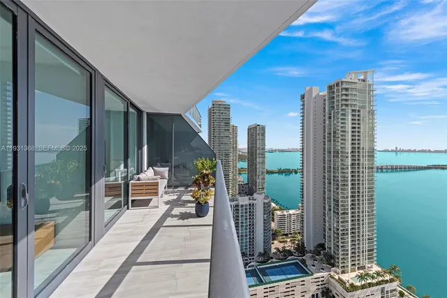 a view of balcony with patio