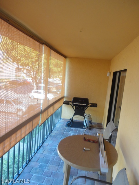 5307 Summerlin Road, Unit 710 Fort Myers, FL 33919 - Photo 14 of 19 a room with furniture and a window