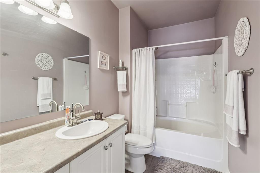 1009 Stockton Ridge Cranberry Township, PA 16066 - Photo 21 of 26 a bathroom with a sink mirror toilet and bathtub