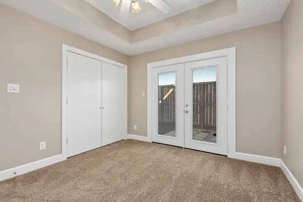 an empty room with a mirror