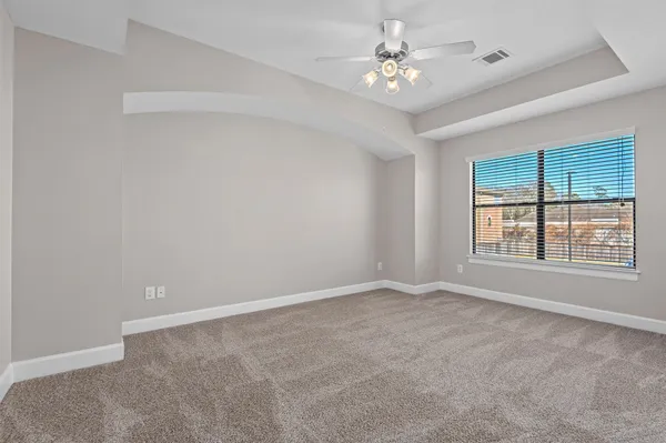 a bathroom with a toilet and a sink