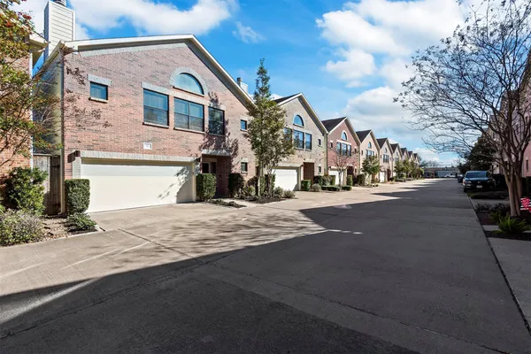 a view of a street with houses