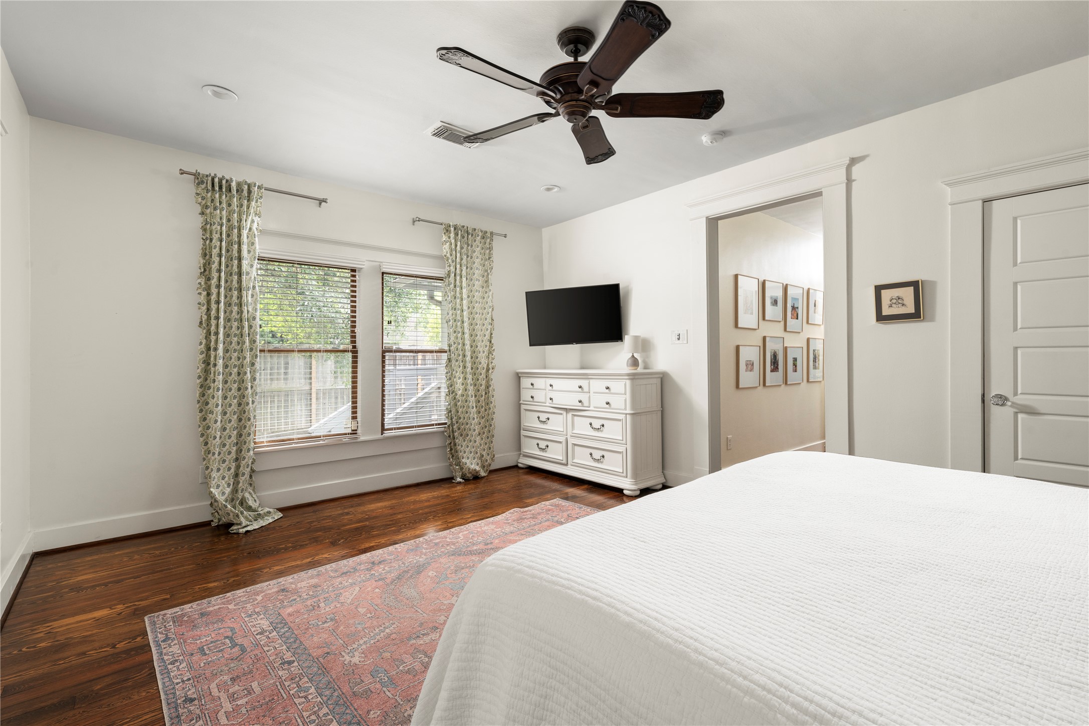 602 Aurora Street Houston, TX 77008 - Photo 21 of 36 Alternate view of the primary bedroom showing the full width of the space and its flexibility. The layout allows for multiple furniture arrangements without feeling constrained. A comfortable setting that maintains a sense of openness.