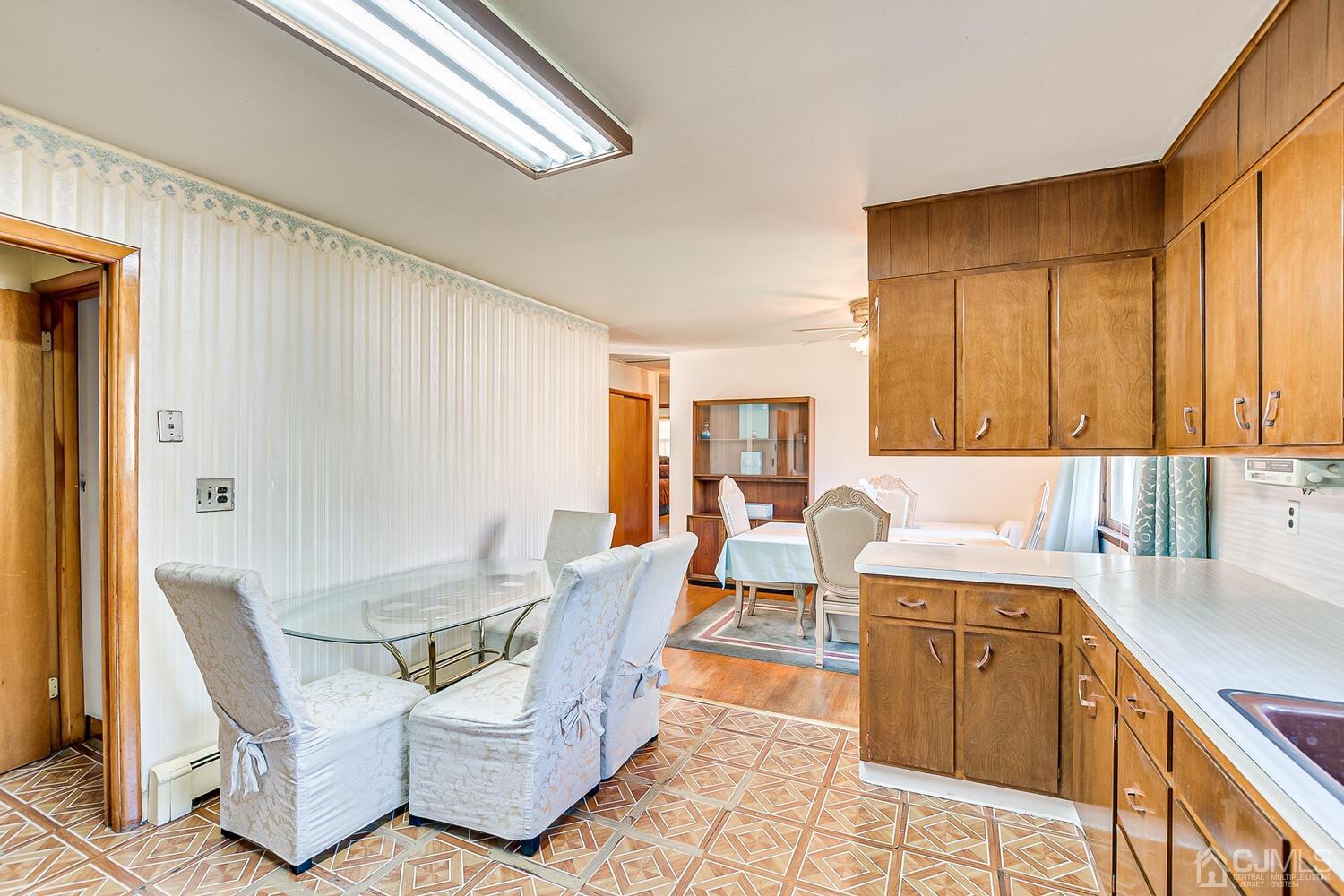 1037 Hamilton Street Somerset, NJ 08873 - Photo 13 of 29 a living room with furniture and a window