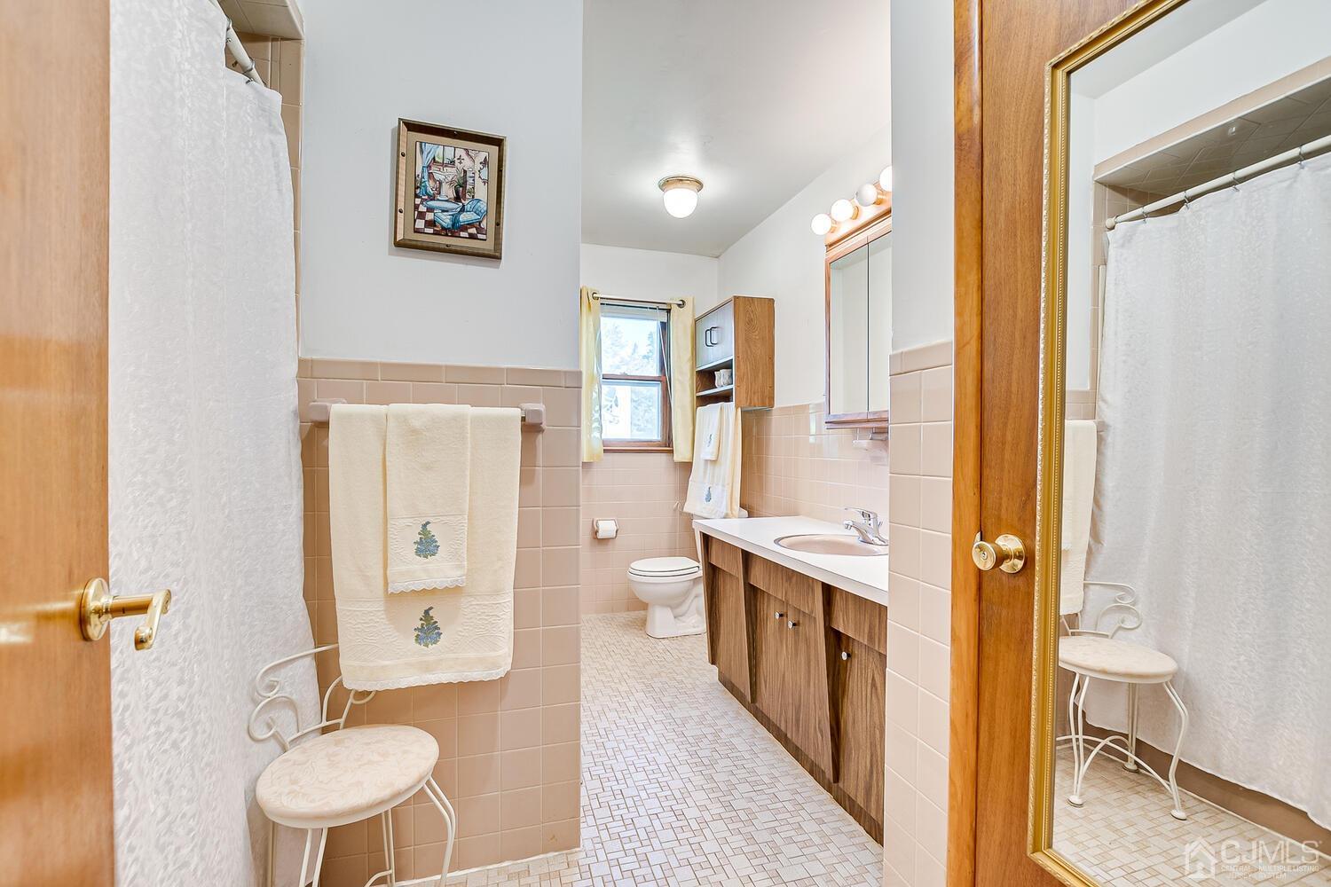 1037 Hamilton Street Somerset, NJ 08873 - Photo 20 of 29 a spacious bathroom with a bathtub shower sink and toilet